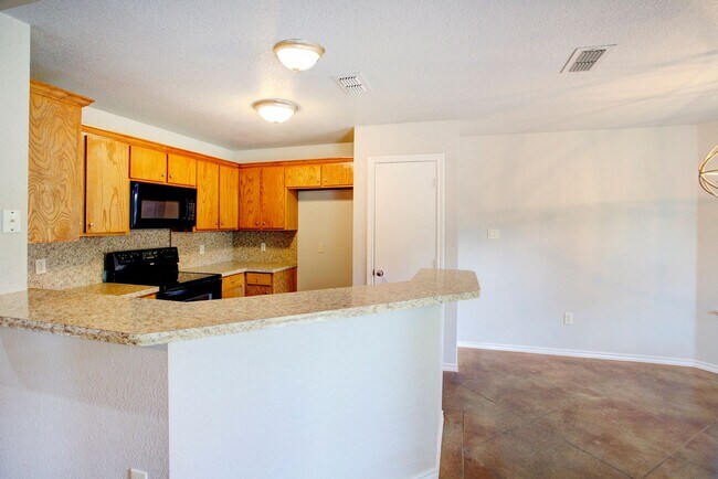 Building Photo - Available July | 4-bedroom 2 bath home in ...