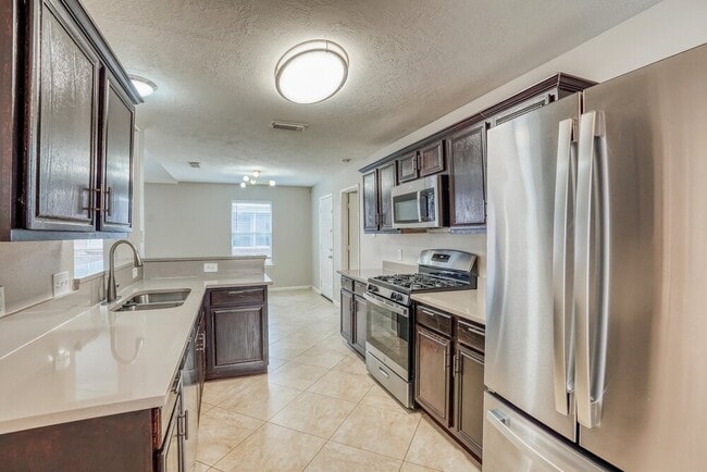 Building Photo - 6614 High Stone Ln
