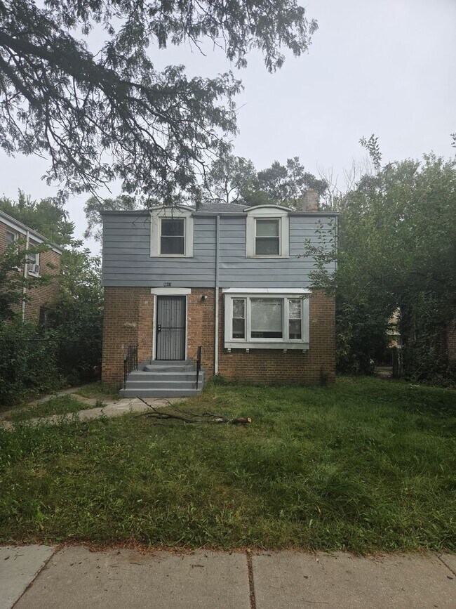 Building Photo - 9911 S Paxton Ave