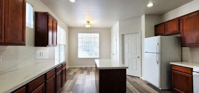 Building Photo - Single-Story 3 Bed, 2 Bath Home in Gated Double Diamond Community – Pool, Gym & 2-Car Garage