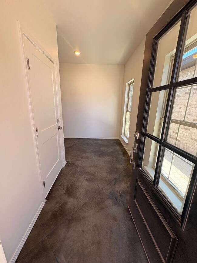 Building Photo - Stunning New 3/2 Townhomes