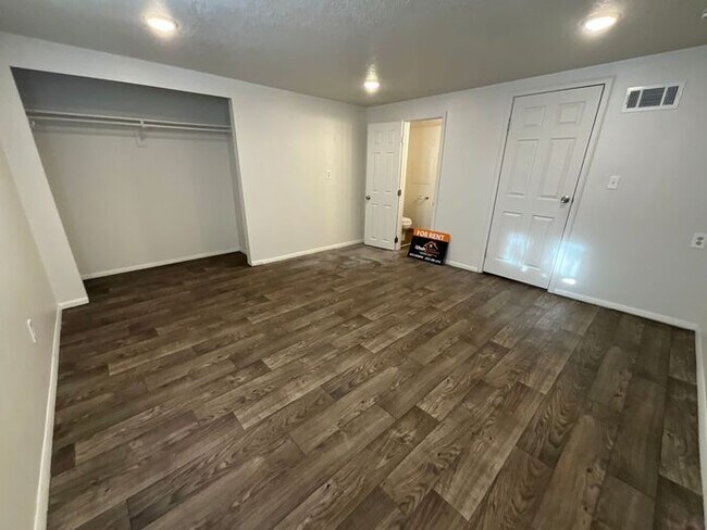 Building Photo - 4 Bedroom 2 Bath Duplex- Carport