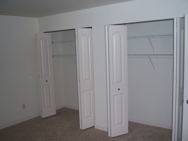 Bedroom closets (closet layout may vary) - 2330 Peters Dr