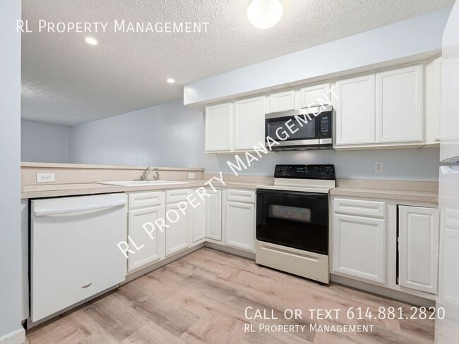 Building Photo - Nice 2 Bedroom/1.5 Bathroom Condo