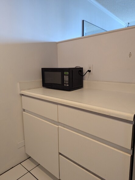 Microwave and storage - 1524 Pensacola St