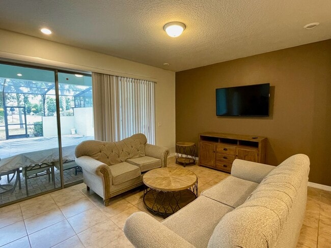 Building Photo - Spacious 5-Bed / 4.5-Bath Townhome w/ Private Pool & Sundeck in Gated Oakmont at Solterra Near Di...
