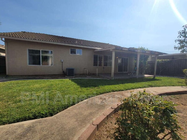 Building Photo - 8440 Zinnia Way