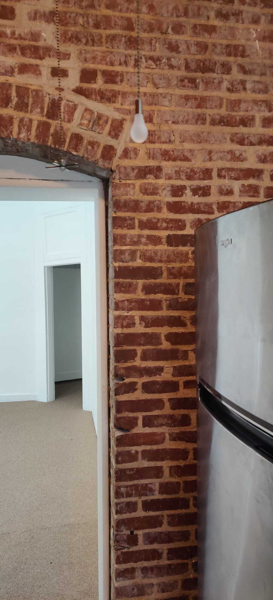 Kitchen looking into LR/DR - 2321 Eutaw Pl