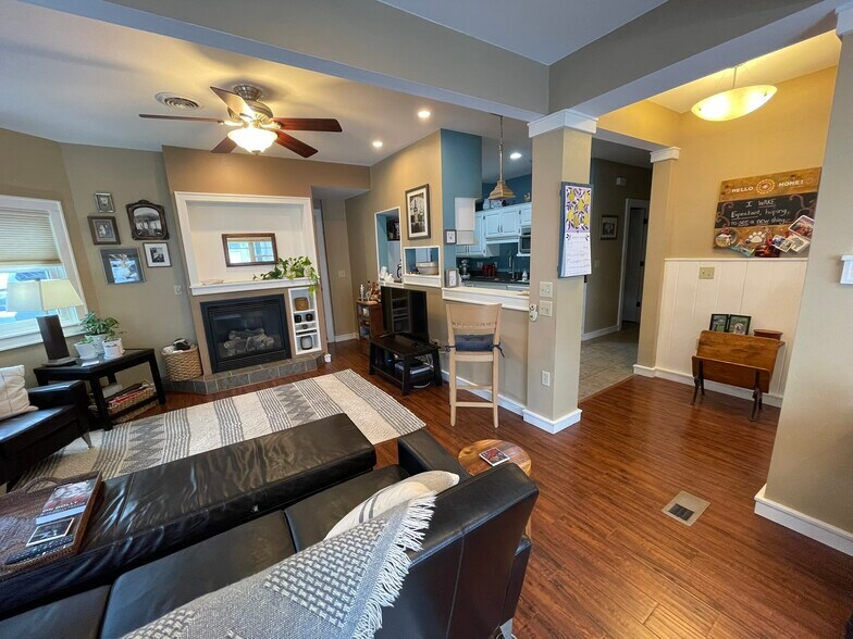 Gas fireplace, built-in & storage behind. - 2010 E Iron St