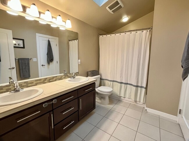 Building Photo - Stylish Greenwood Townhome with Private Patio & Modern Finishes