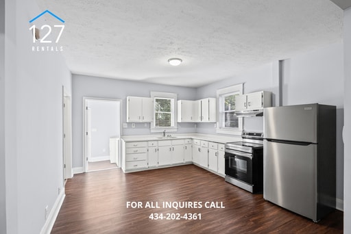 Building Photo - Updated 2BR Duplex with Central Air & Washer/Dryer – Water, Sewer & Trash Included!