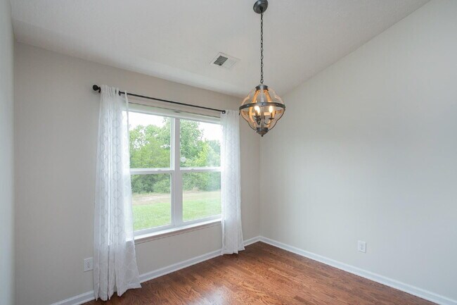 Building Photo - Single-level 2-bed, 2-bath townhome in 55+ community with pool, clubhouse, fitness center and gro...