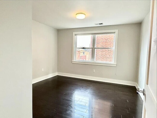 Building Photo - Sleek One-Bedroom in Eastern Market - Parking Spot Included!