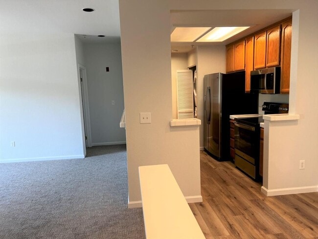 Building Photo - Spacious 2BR/2BA Redwood Shores Condo with Balcony, Natural Light & Garage Parking