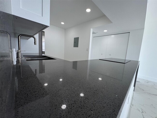 Building Photo - 3675 N Country Club Dr