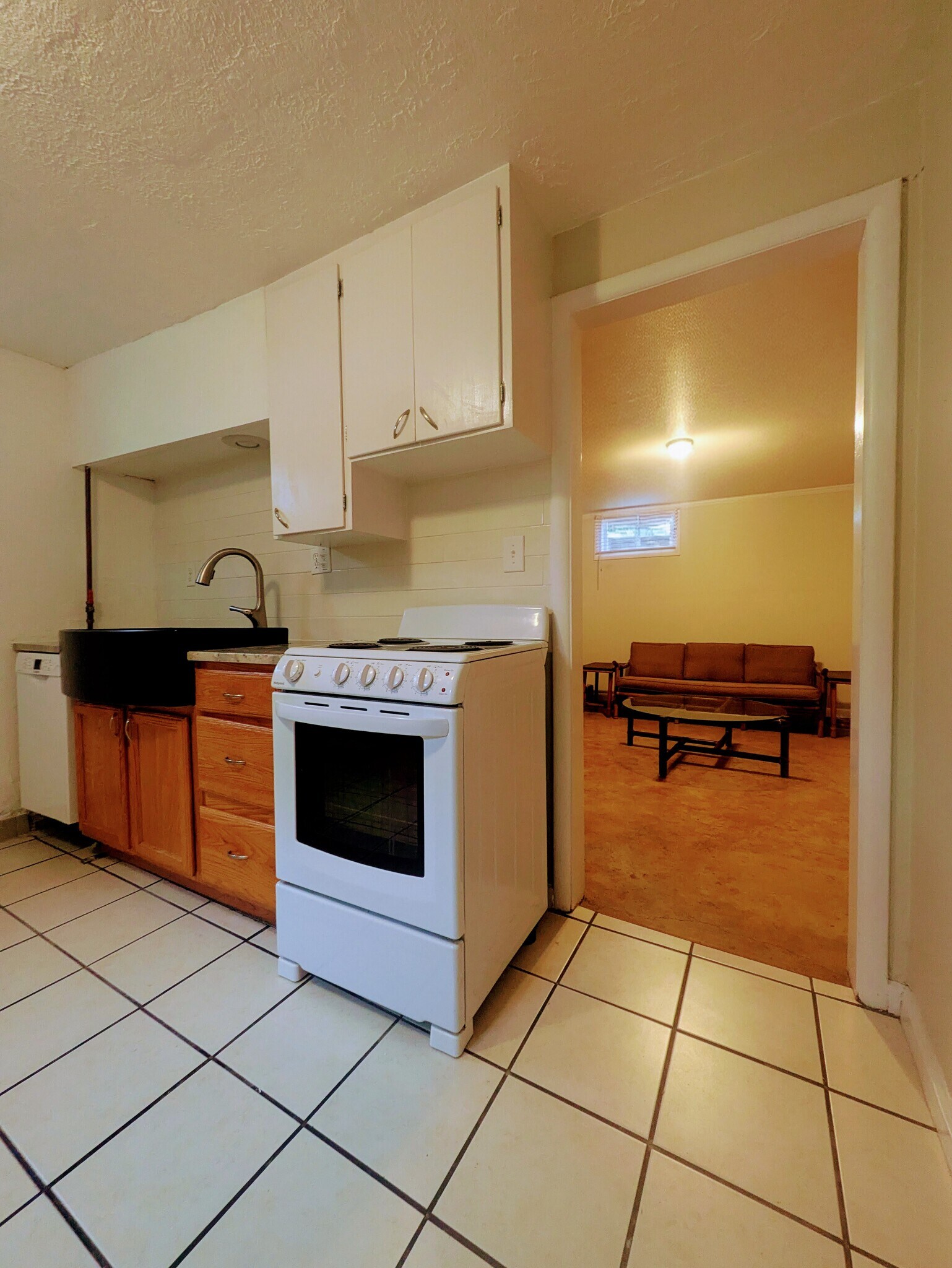 Updated kitchen includes dishwasher, granite counters - 414 N Avenue E Ave