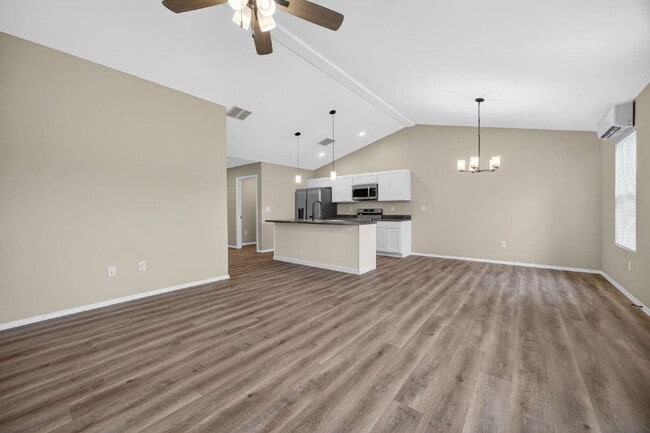 Building Photo - BRAND-NEW 4BR/2BA Duplex/Patio home with Garage - Available Now near Hollister, Schools