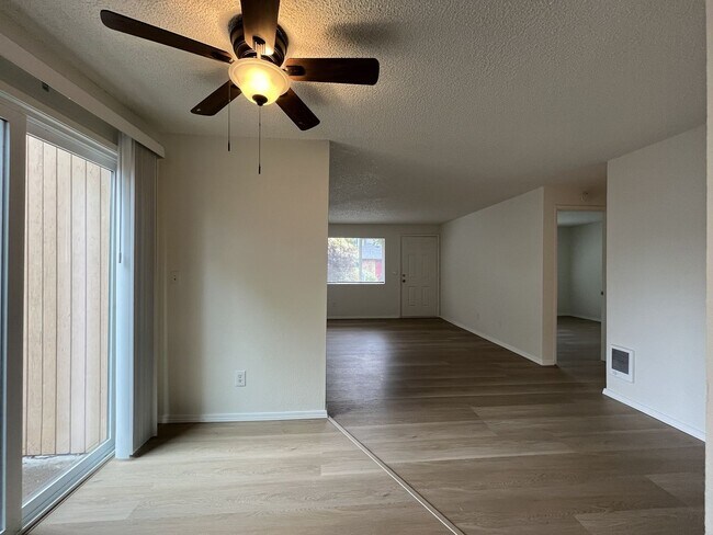 Building Photo - Inviting 2 Bedroom Home with Open Layout, Stainless Steel Appliances & Private Outdoor Retreat