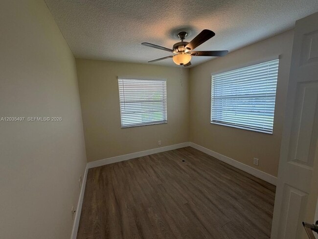 Building Photo - 8443 Royal Palm Blvd