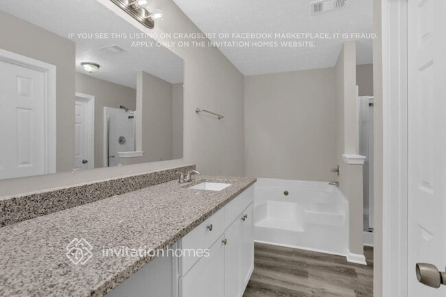 Building Photo - 6017 Happy Trails Ct