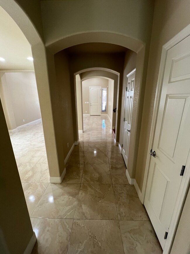 Building Photo - A Fantastic 4 Bedroom Home with the primary Downstairs, in Silverado Ranch