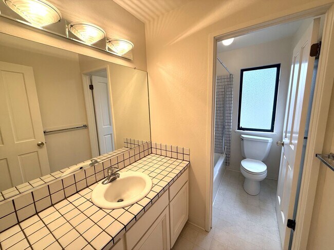 Building Photo - SPACIOUS FOUR BEDROOM / THREE AND HALF BAT...