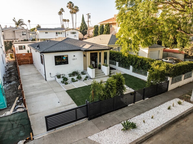 Building Photo - Brand-New Designer Home — 2 Bed + 2 Bath + Office | Gated Yard & Private Driveway Parking