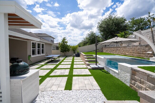 Building Photo - "Spacious 4-Bedroom Retreat with 3 Full Baths in Winter Garden's Serene Sanctuary"