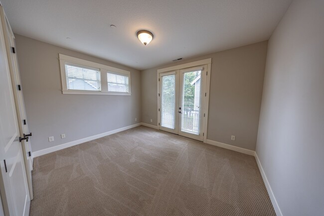 Building Photo - 2 Creeks Condominiums - Gated Community on...