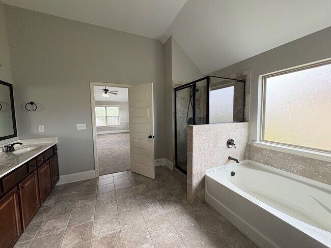 Building Photo - Beautiful 5 Bedroom Home with Massive Walk...