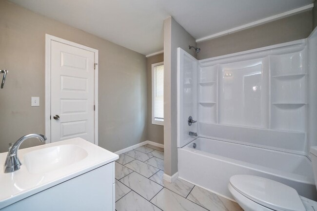 Building Photo - Move-In Ready 4BR with Renovated Interiors...