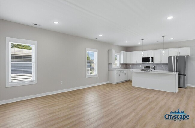 Building Photo - CHIC NEW 2 BEDROOM APARTMENT IN THE CHURCH HILL NORTH NEIGHBORHOOD