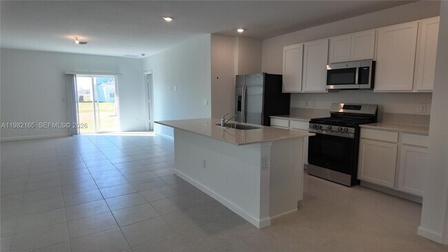 Building Photo - 10722 NW Moon Rise Ln