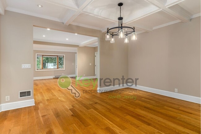 Building Photo - Spacious 3BR Home with Finished Attic, Fenced Yard & Easy NYC Commute – No Broker Fee