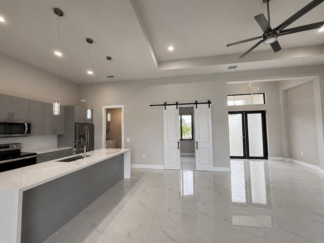 Building Photo - Move In Special! Pool Home with Canal View
