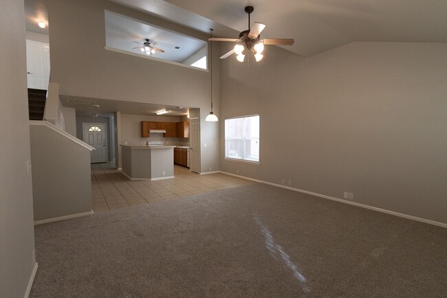 Building Photo - SPACIOUS 4 BEDROOM 2.5 BATH FEATURING MAST...