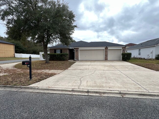 Building Photo - Charming 4-Bedroom Home with Private Yard,...