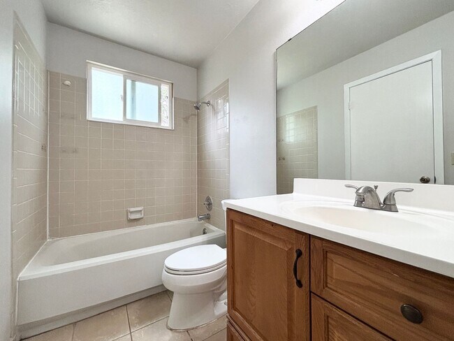 Building Photo - Awesome Split Entry with New Paint & Floor...