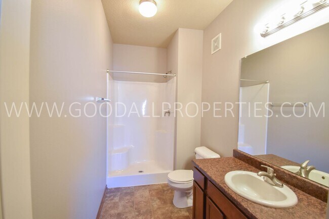 Building Photo - Spring Move-in special; 2 Bedroom 2 Bath Condo on the Ground level with detached garage!