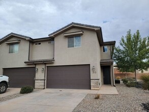 Building Photo - Pet Friendly and Modern End-Unit Townhome!