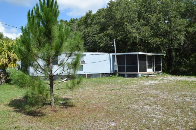 Building Photo - 2BR, 1BA Mobile Home with screened patio