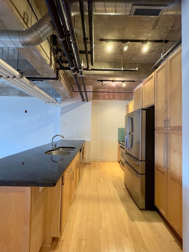 Building Photo - Stunning Industrial-Contemporary One Bedroom Condo- Parking included!