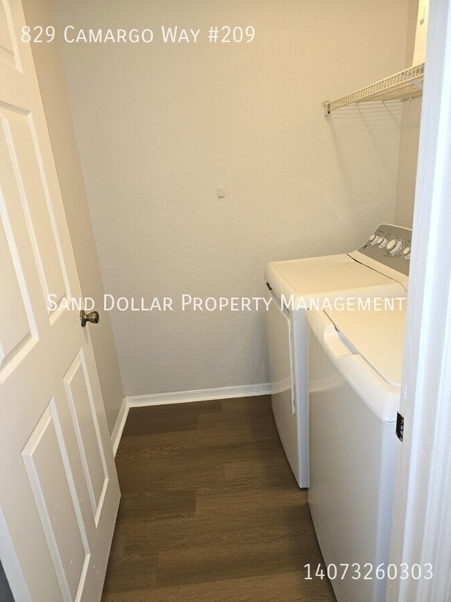 Building Photo - Wonderfully renovated 2nd floor condo in a...