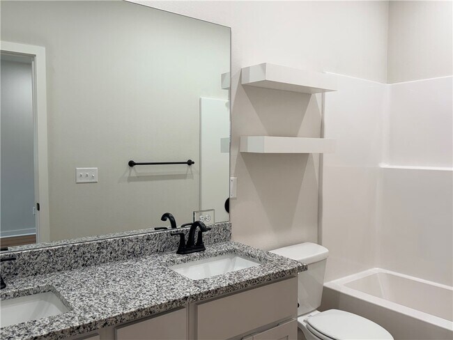 Building Photo - 613 Cosmos St