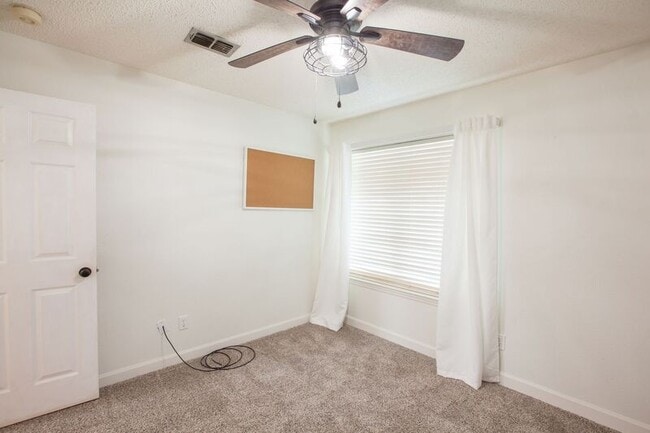 Building Photo - 8204 Tavaros Dr