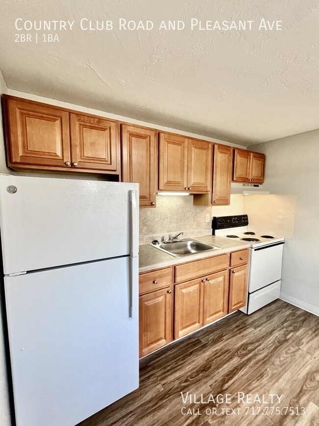 Building Photo - New Cabinets & Flooring! Large 2-bed w/ ea...