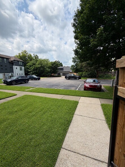 View out of your private patio showing private parking. Property comes with 2 parking passes! - 2017A Beech Ave