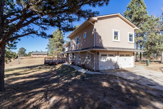 Building Photo - Spacious Country Retreat on 5.5 Acres | Barn, Deck & Pikes Peak View!!