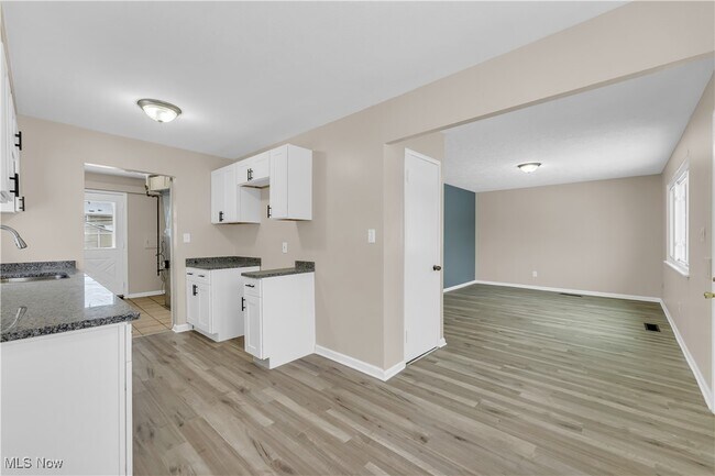 Building Photo - 7611 Newport Ave