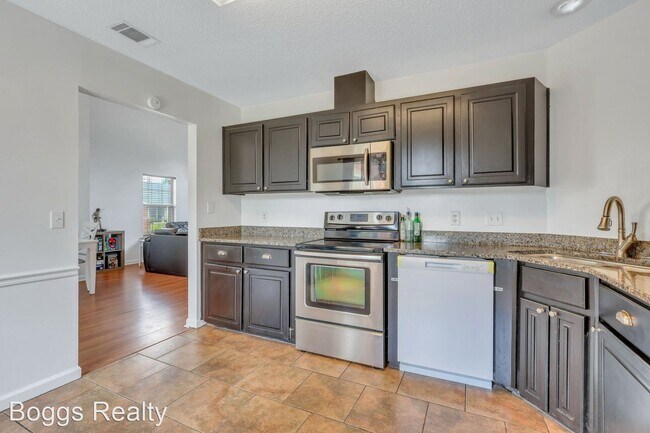 Building Photo - 4 br, 2.5 bath House - 1950 Woking Court